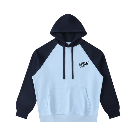 Urbanova Contrast Raglan Hoodie showcasing a blue and navy color-block design, perfect for everyday wear.