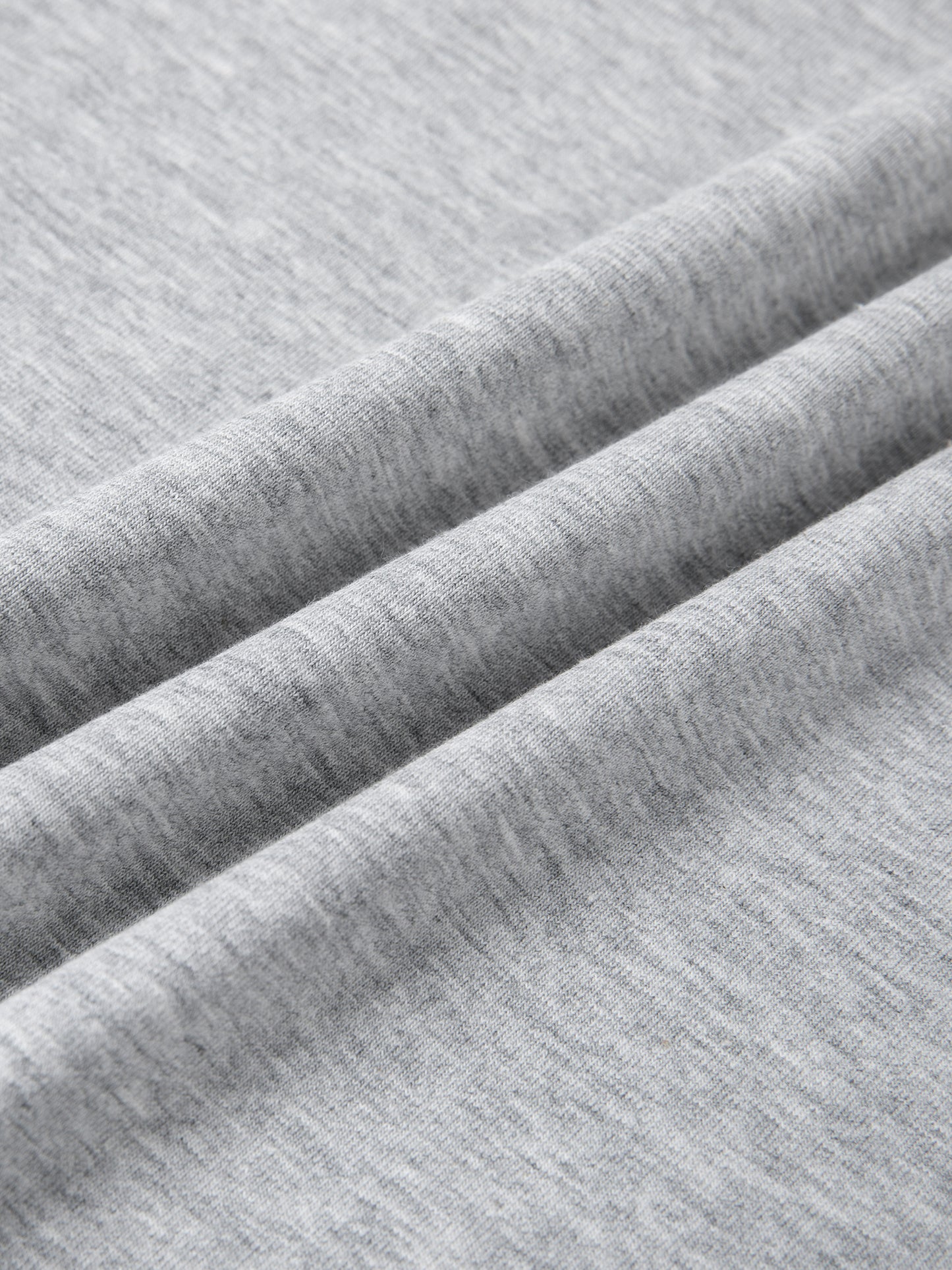 Close-up of soft cotton-blend fabric showcasing the texture of the Urbanova Essential Crew Tee.