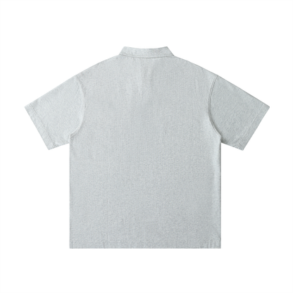 Back view of Urbanova-Loose Cotton Polo Shirt in light gray, showcasing its relaxed fit and premium cotton material.