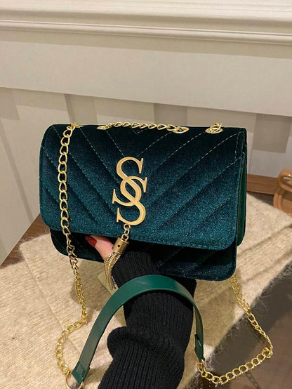 Refined Embossed Letter Shoulder Bag – New Year Collection in dark green velvet with gold chain.