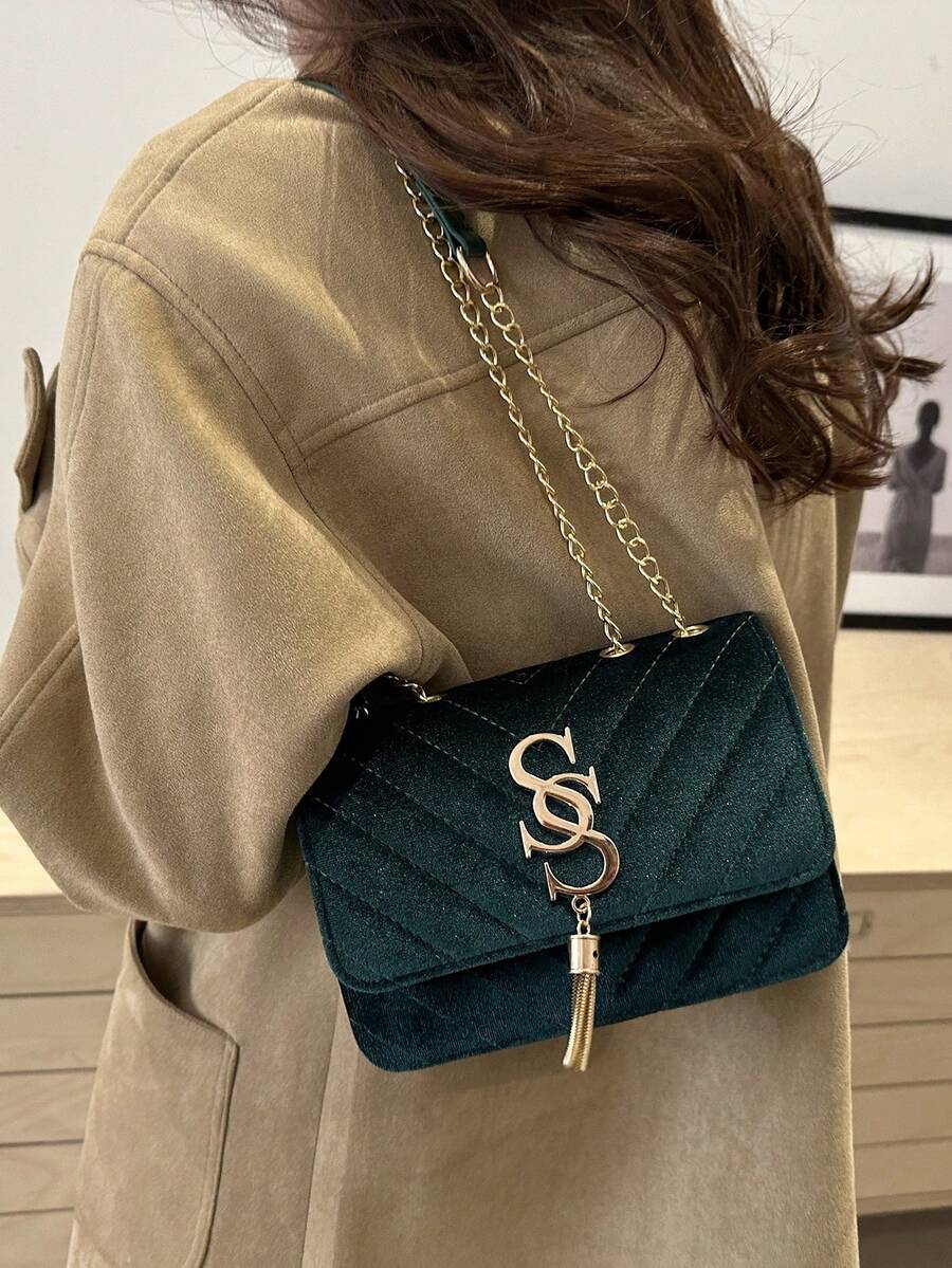 Refined Embossed Letter Shoulder Bag – New Year Collection in elegant green color, showcasing sophisticated style and versatility.