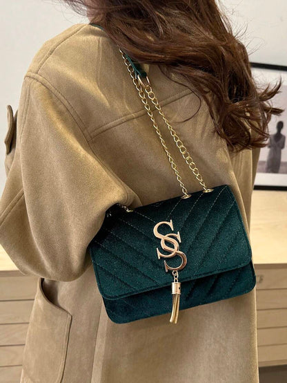 Refined Embossed Letter Shoulder Bag – New Year Collection in elegant green color, showcasing sophisticated style and versatility.