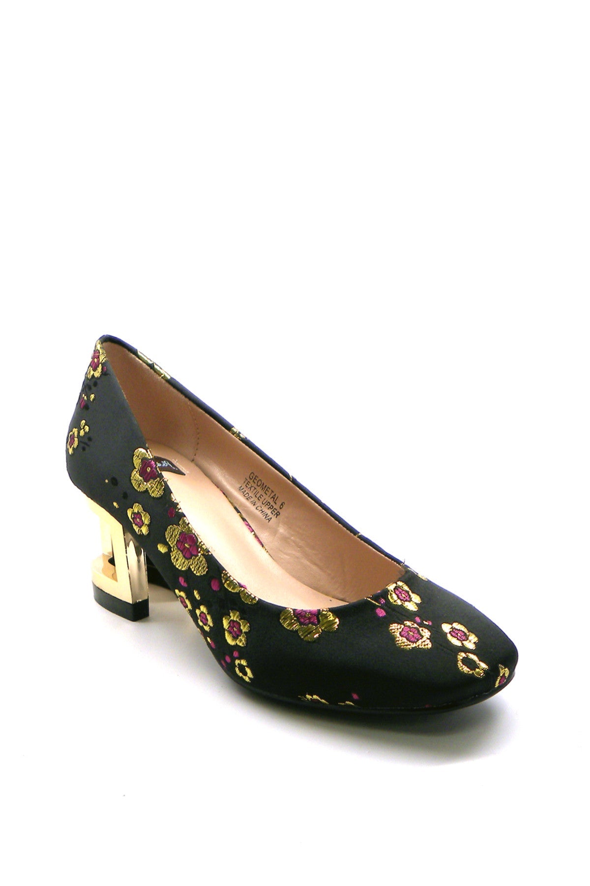 Black high-heeled shoe with floral pattern on a white background