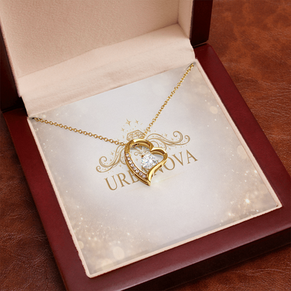 Urbanova Timeless Love Zircon Heart Pendant Necklace displayed in a jewelry box with a gold finish and sparkling crystal.