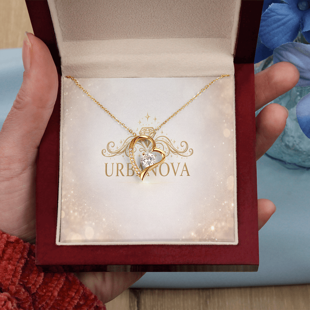 Urbanova Timeless Love Zircon Heart Pendant Necklace displayed in a luxurious gift box with a gold finish.