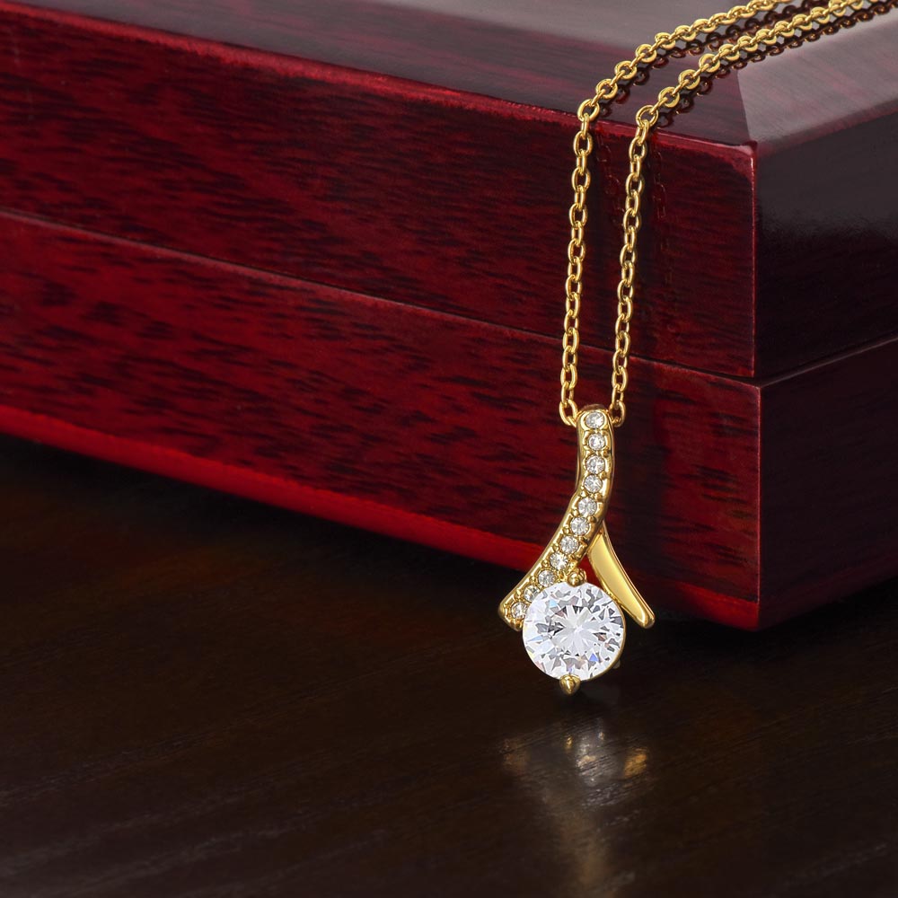 Forever Curve Love Necklace featuring a sparkling cubic zirconia, symbolizing infinite love.