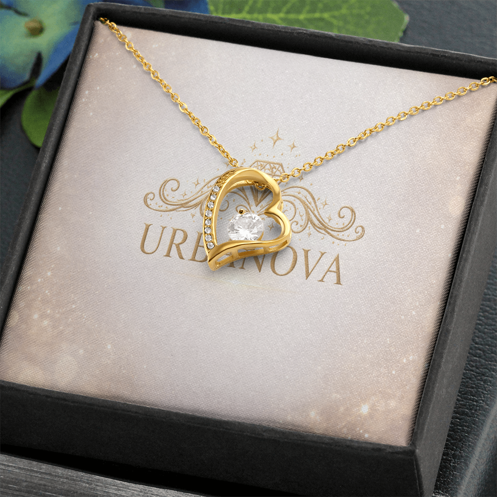Urbanova Timeless Love Zircon Heart Pendant Necklace in a gold finish showcasing a sparkling heart pendant.
