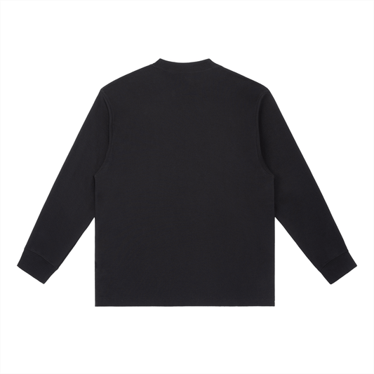 Back view of the Essential Crewneck Long-Sleeve T-Shirt in black, showcasing its loose fit and long sleeves.