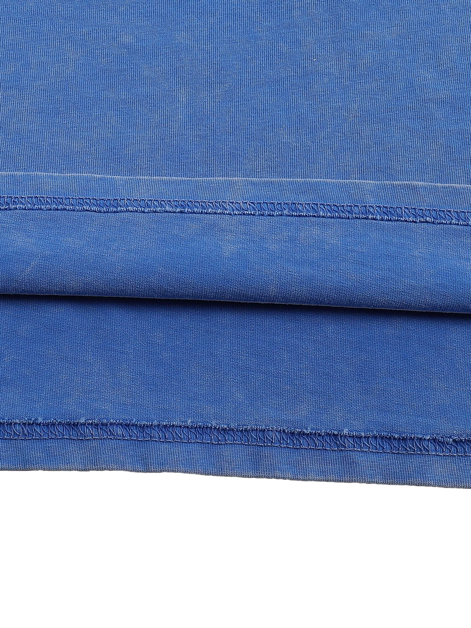 Urbanova-Washed cotton T-Shirt showing the soft blue fabric and stitching details for a relaxed fit.