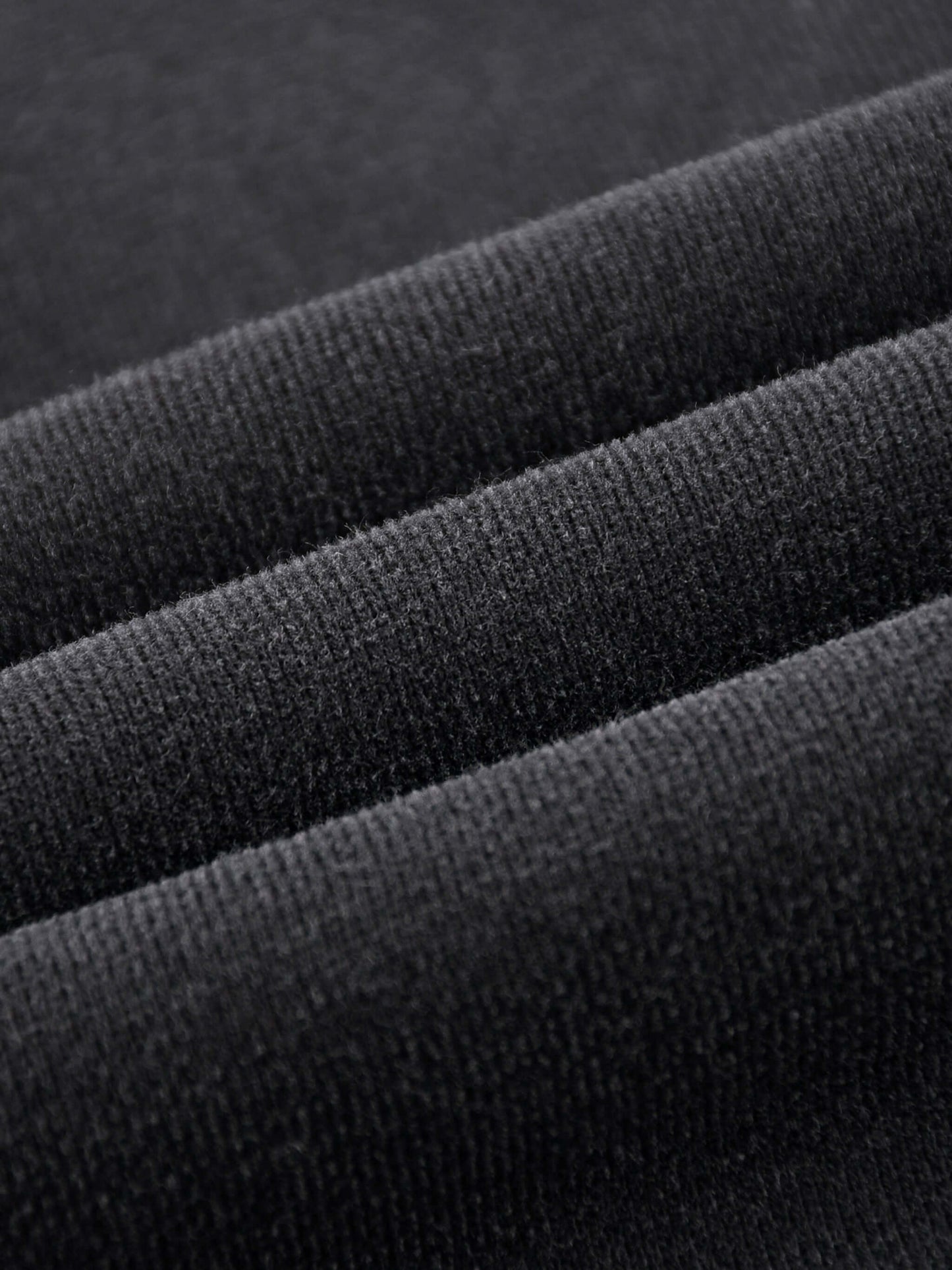 Close-up of the soft fabric texture of the URBANOVA-Acid Washed Fleece Hoodie, showcasing its premium cotton quality.