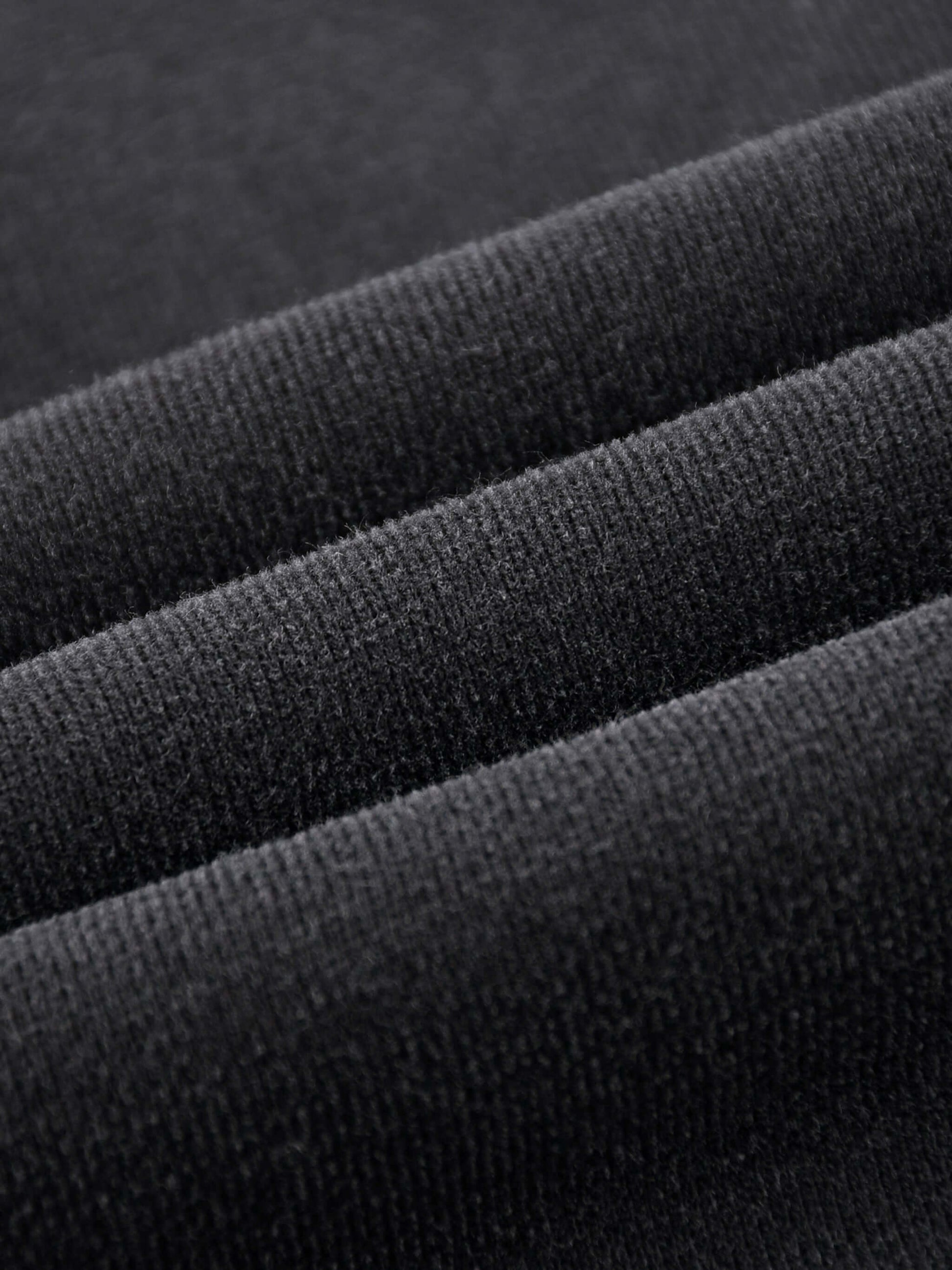 Close-up of the soft fabric texture of the URBANOVA-Acid Washed Fleece Hoodie, showcasing its premium cotton quality.