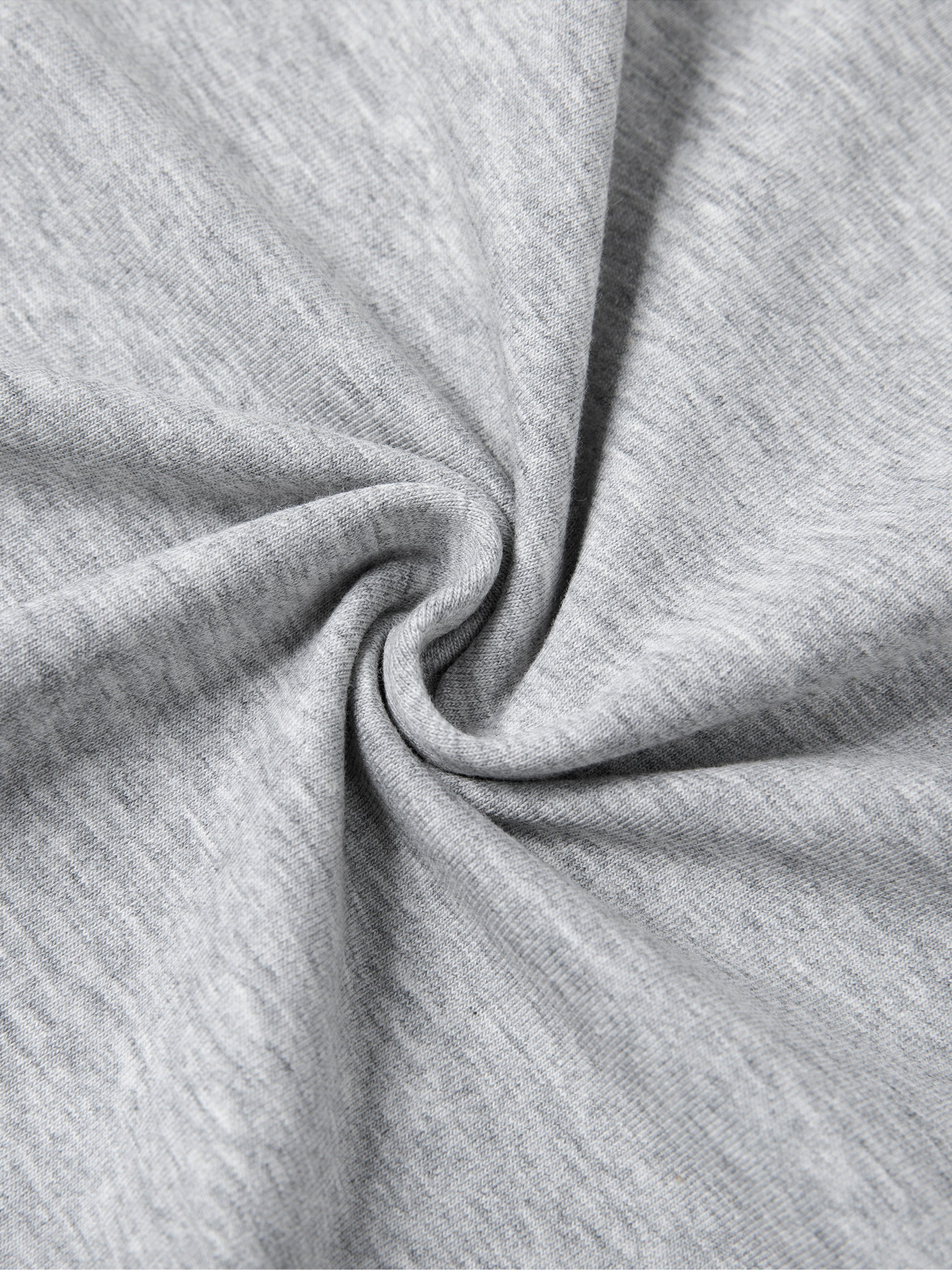 Close-up of soft grey fabric showcasing the quality of the Urbanova Essential Crew Tee.