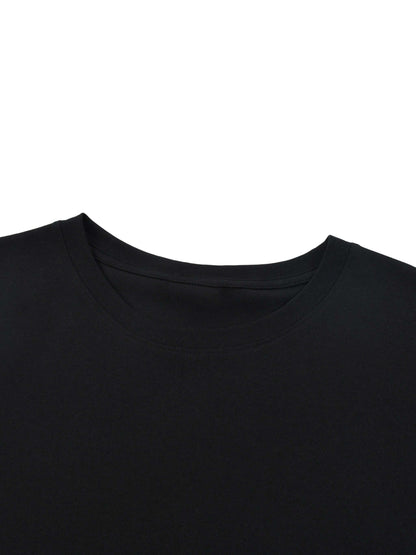 Lightweight Cotton Classic Fit T-Shirt close-up of round neck design in black fabric, showcasing 100% cotton material.
