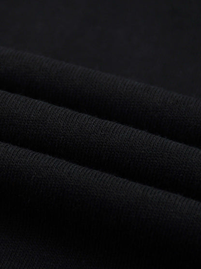 Lightweight Cotton Classic Fit T-Shirt fabric close-up showing soft, thin black cotton texture.